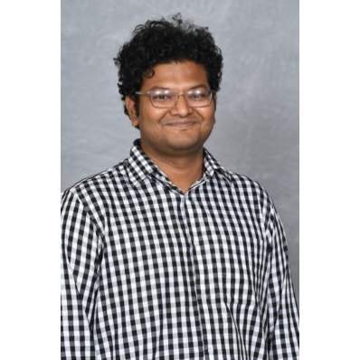 A person wearing glasses and a checkered shirt

AI-generated content may be incorrect.