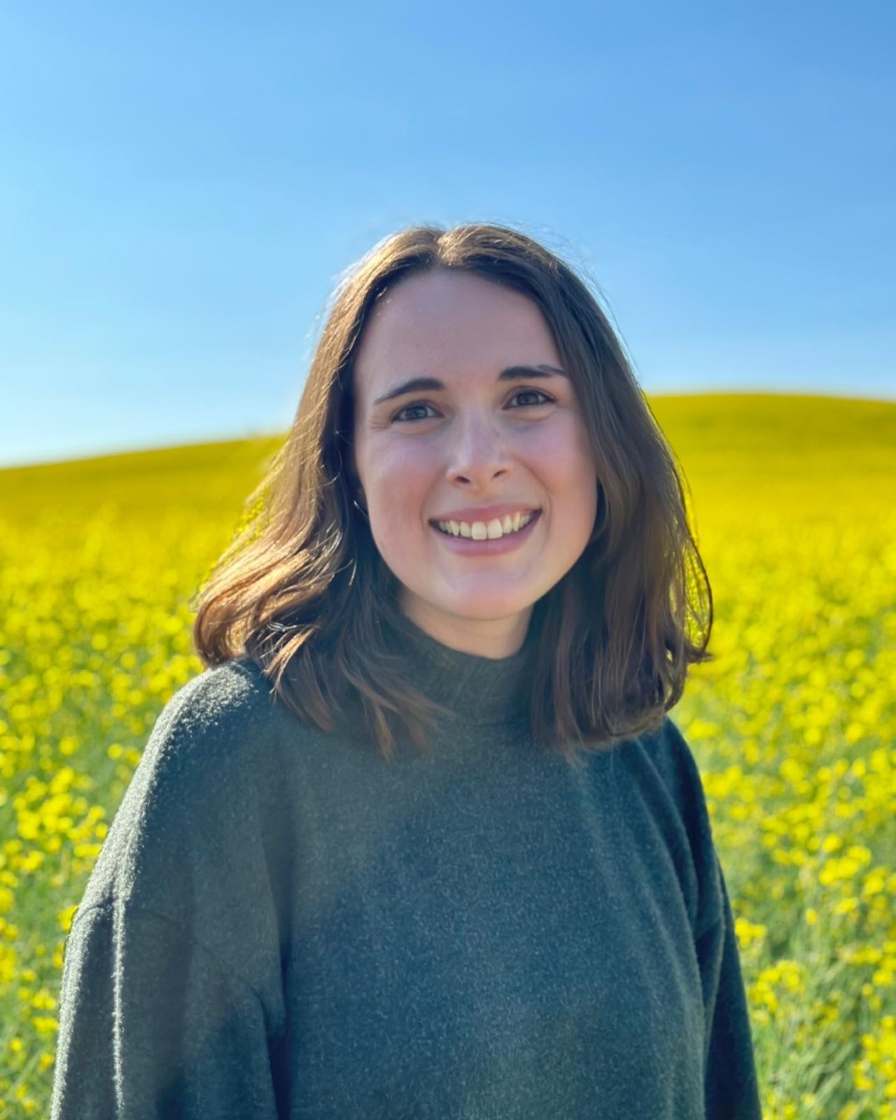 A person standing in a field of yellow flowers

AI-generated content may be incorrect.