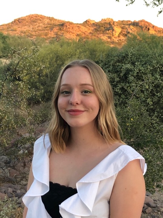 A person smiling at the camera

AI-generated content may be incorrect.