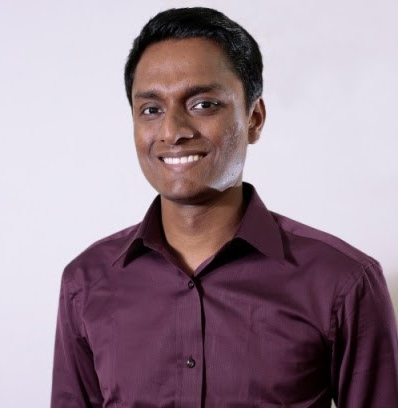 A person in a purple shirt

AI-generated content may be incorrect.