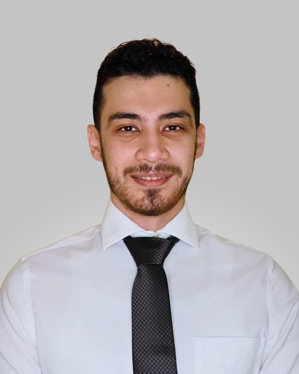 A person in a white shirt and tie

AI-generated content may be incorrect.