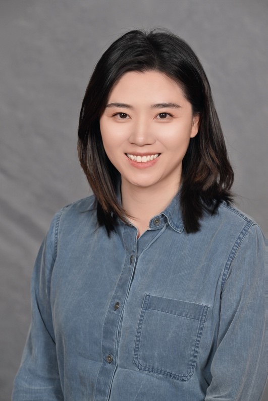 A person with dark hair wearing a blue shirt

AI-generated content may be incorrect.
